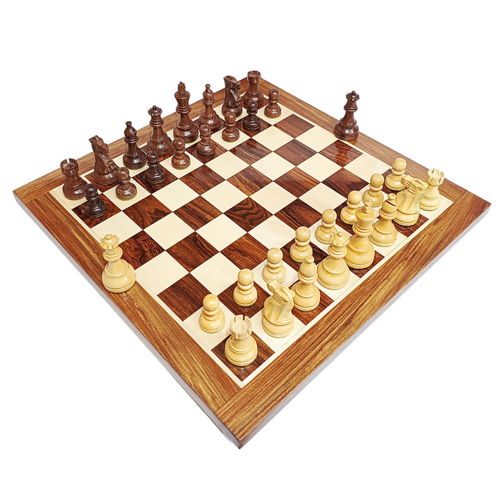 Wooden chessboard with pieces on a white background