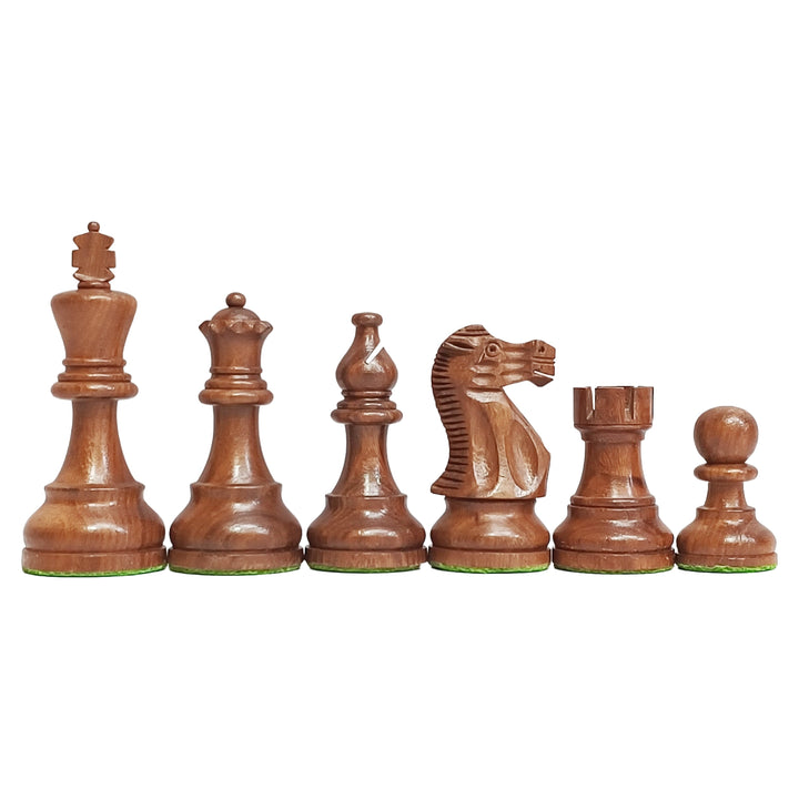 Close-up of handcrafted Staunton chess pieces in golden rosewood, showcasing king, queen, bishop, knight, rook, and pawn.