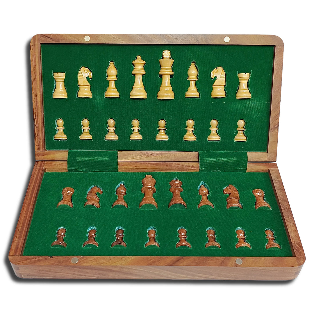 Magnetic travel chess set opened, featuring golden rosewood and maple pieces on green felt interior.