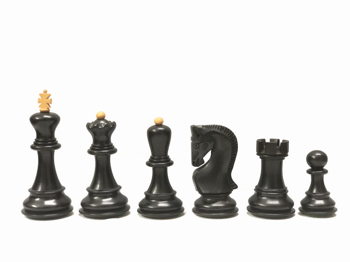 Ebonized chess pieces set featuring king, queen, bishop, knight, rook, and pawn in a luxury design.