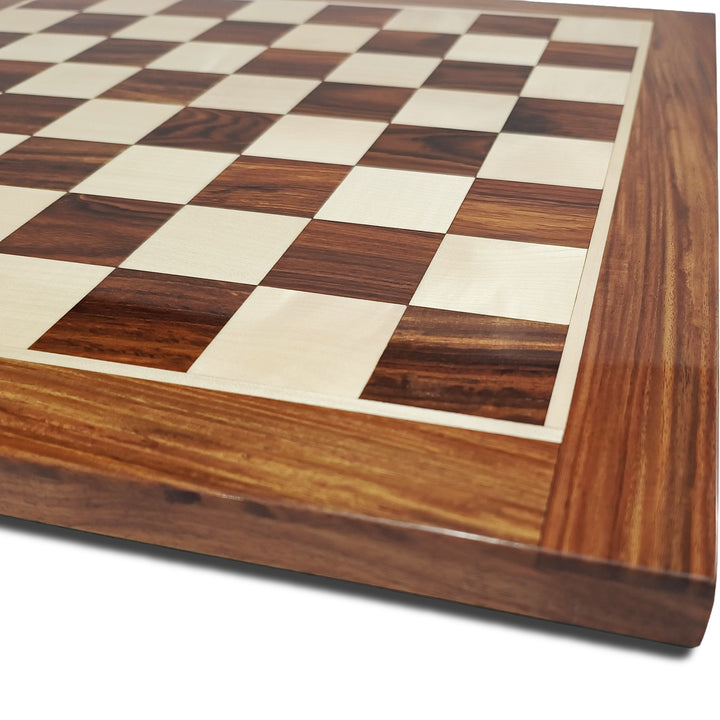 Luxurious handcrafted wooden chess board with a classic checkered design in golden rosewood and maplewood.