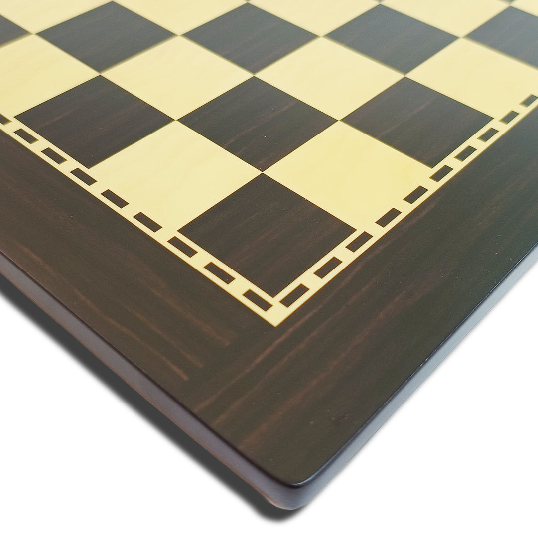 Close-up of hand crafted wooden chess board with elegant acacia and ebony finish, featuring classic black and cream squares.