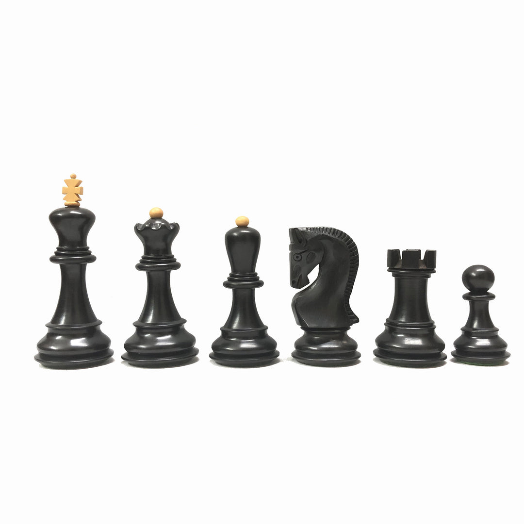 Ebonized chess pieces showcasing king, queen, knight, rook, and pawn designs; elegant and luxurious.