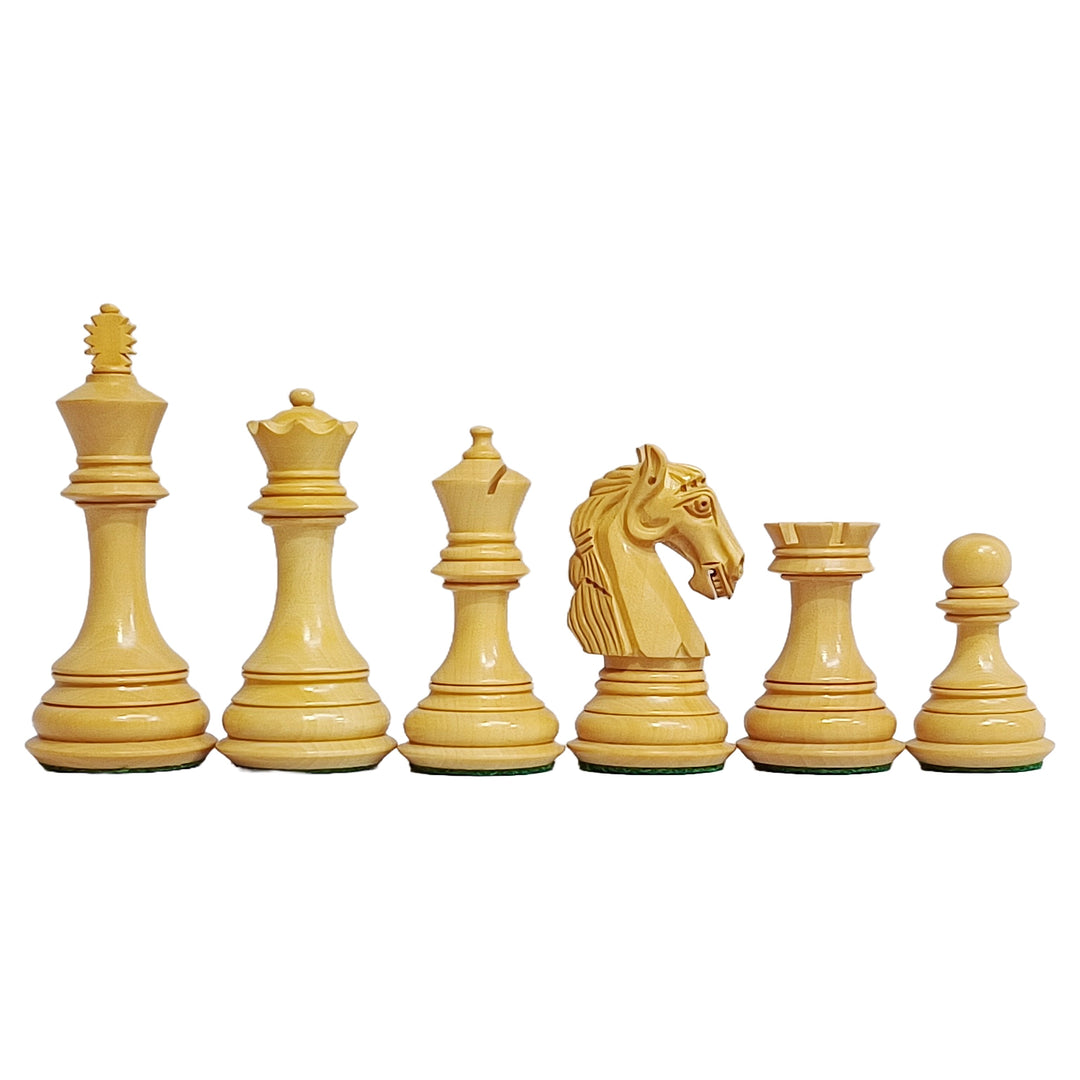 Colombian Staunton chess pieces in boxwood, featuring king, queen, rook, bishop, knight, and pawn.