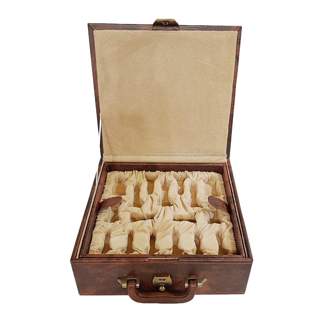 Open wooden chess box with compartments for storing luxurious Staunton chess pieces securely.