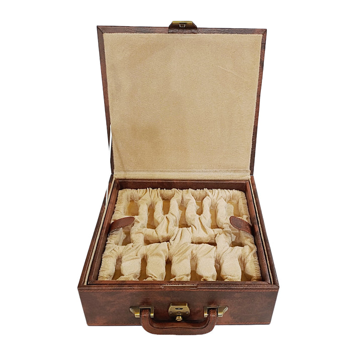 Open wooden chess box with compartments for storing luxurious Staunton chess pieces securely.